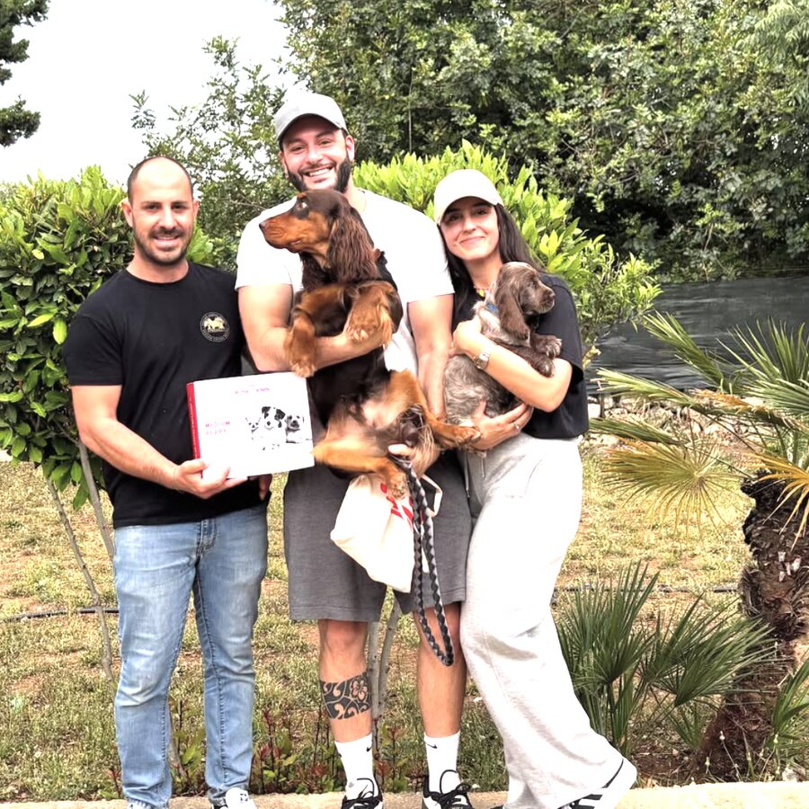 A family with their new puppy